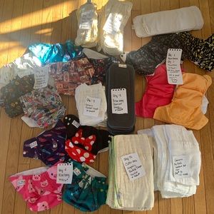 Variety of new and used cloth diapers/supplies in excellent condition!